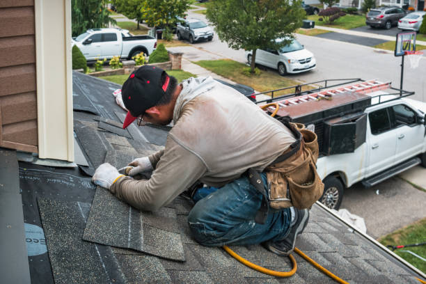Professional Roofing technician working in Madison, CA